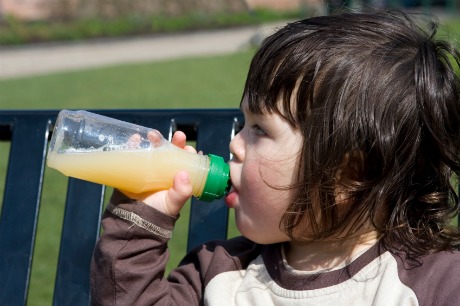 The independent evaluation found that FDAC families were more likely to be reunited than those in ordinary care proceedings. Young child on bench with a bottle